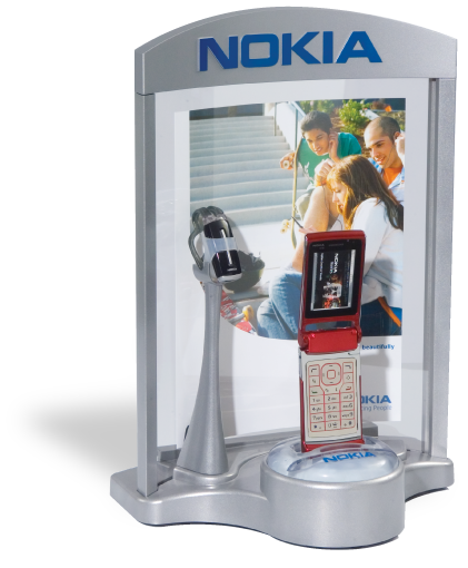 Develop a branded counter display that can also fasten to slatwall. Cast aluminum base with a silicon holder and security pull box, injectioncap